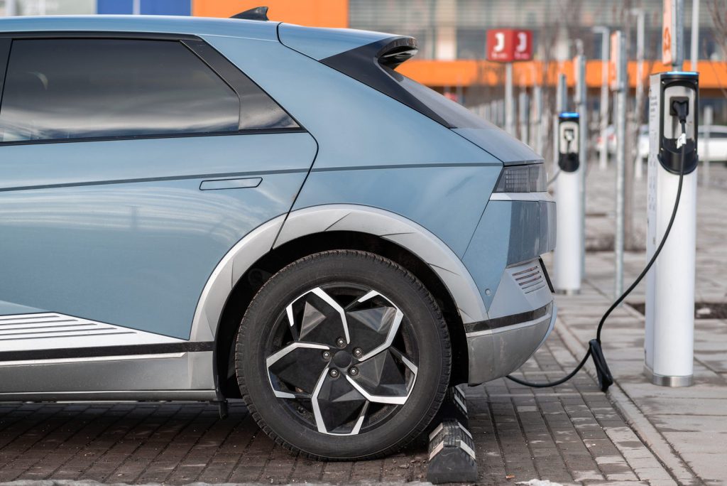 Electric car connected to a charging station