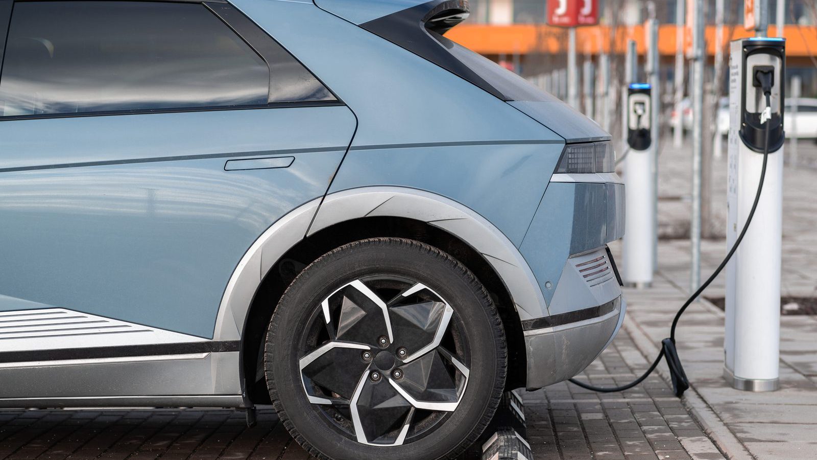 Electric car connected to a charging station
