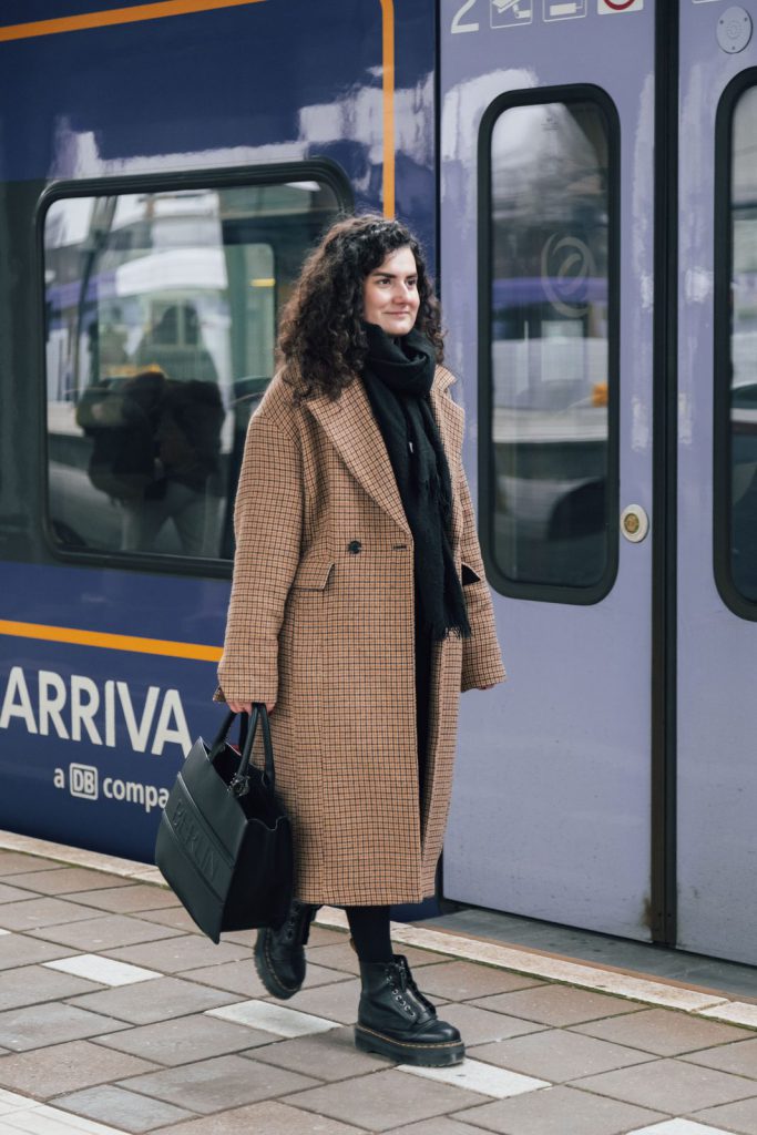 Commuter walking along a train platform
