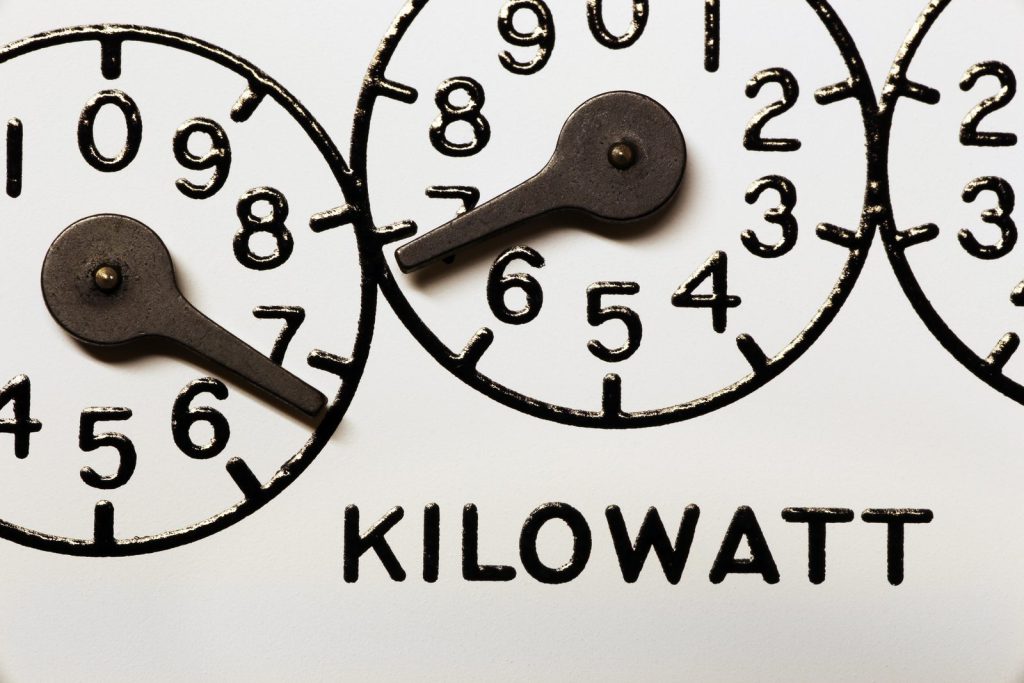 Electricity meter dials showing kilowatts